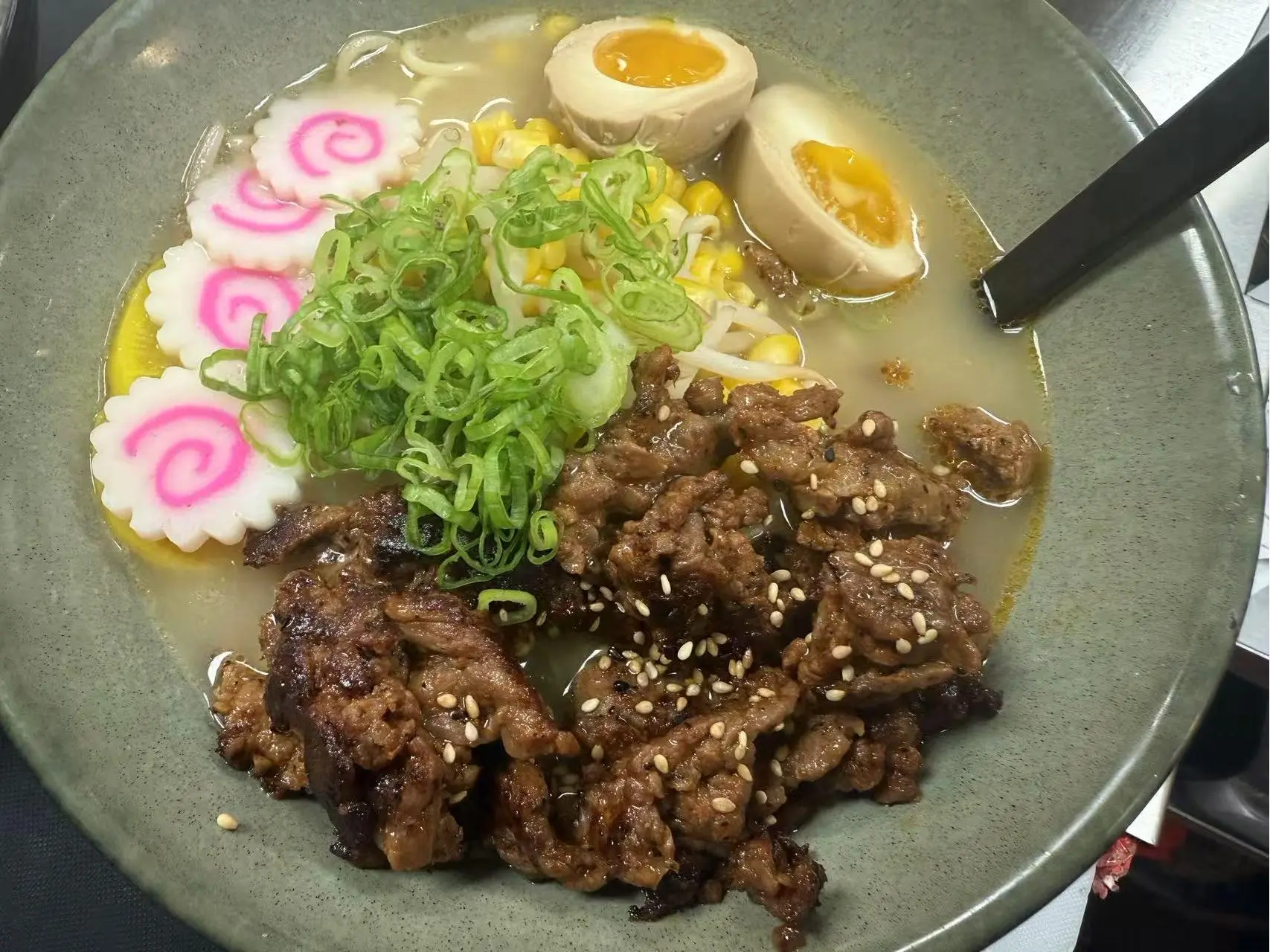 OK-Ramen&Sushi-Bar-Japanese-Restaurant-Beef-Ramen-Oklahoma-City Beef Ramen - Ramen with tender beef, soft - boiled eggs, and vegetables in a savory broth at OK Ramen & Sushi Bar, a Japanese Restaurant in Oklahoma City