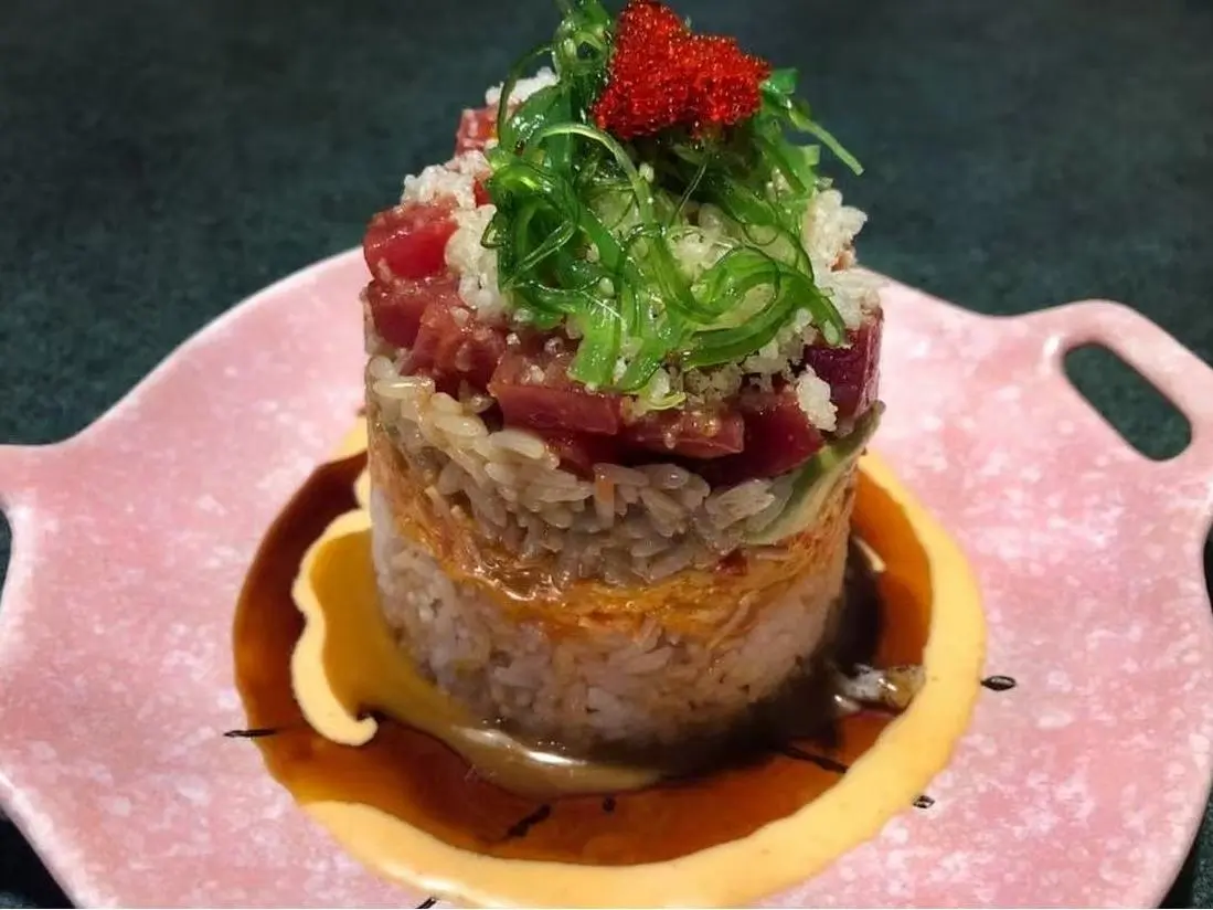 OK-Ramen&Sushi-Bar-Japanese-Restaurant-Tuna-Rice-Tower–Oklahoma-City Tuna Rice Tower - Stacked rice with fresh tuna, garnished with seaweed and fish roe at OK Ramen & Sushi Bar, a Japanese Restaurant in Oklahoma City